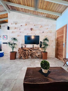 Casa en Villas Jubey con acceso al Hotel Emotion By Hodelpa